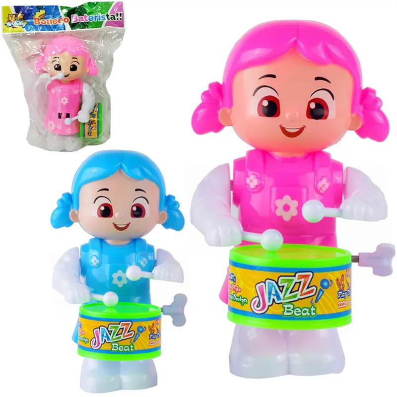 BONECA COM TAMBOR A CORDA